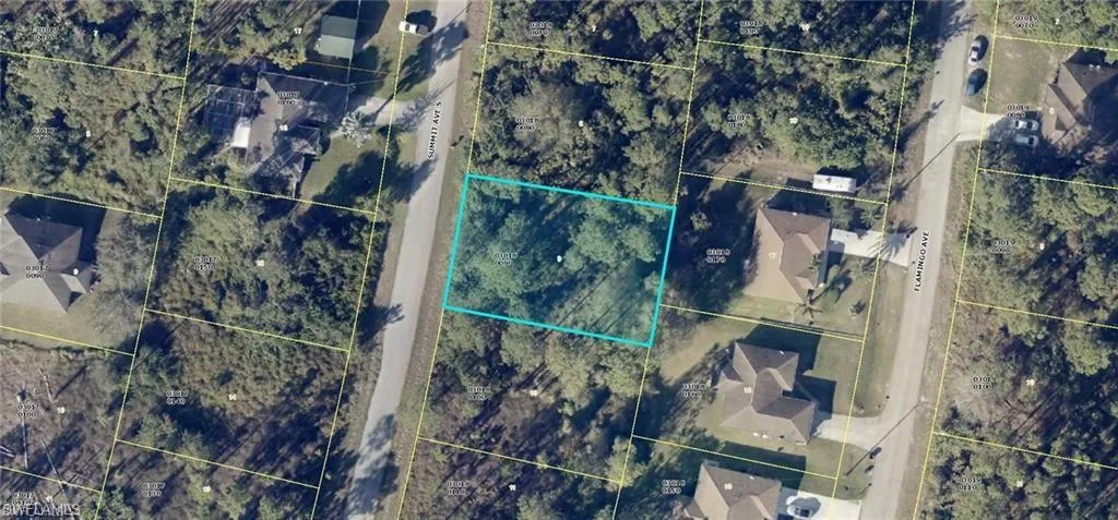 Aerial map of property and surrounding area featuring property parcel outlined