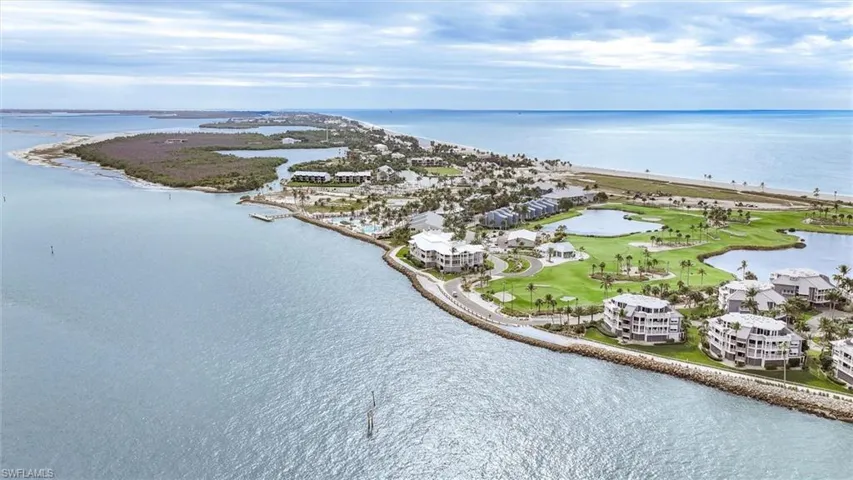Bird's eye view of a large body of water and a golf course