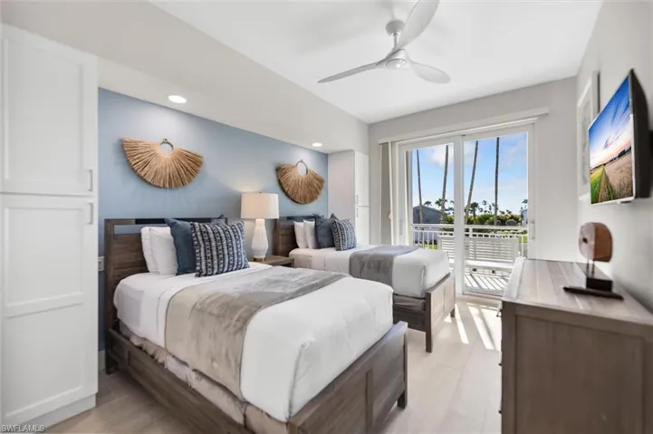 Bedroom featuring access to exterior, a ceiling fan, and recessed lighting