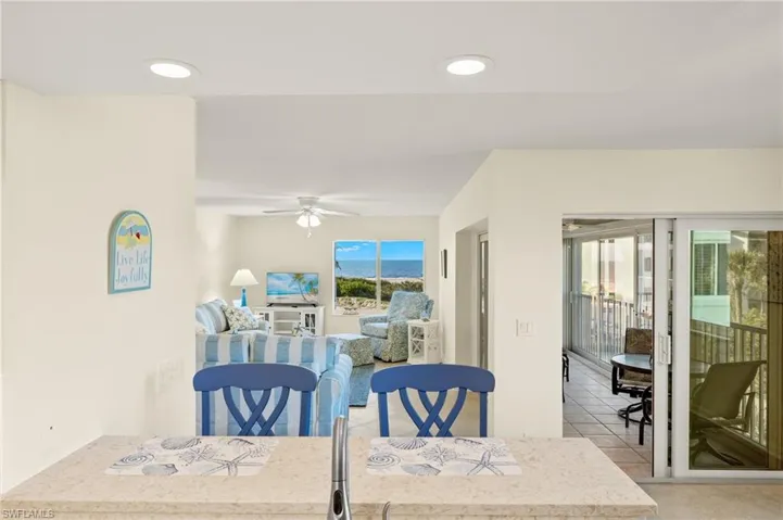 Dining room featuring recessed lighting, a ceiling fan, and light tile patterned floors