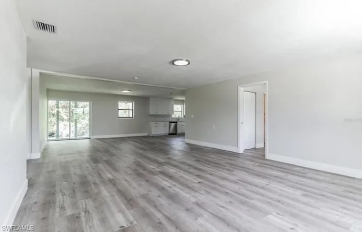 Unfurnished living room featuring light hardwood / wood-style flooring