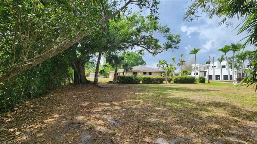 Back of lot along canal to street