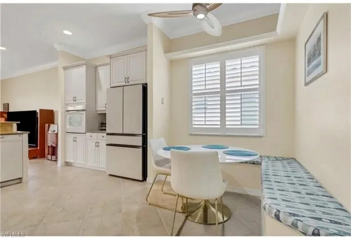 Dining area featuring ceiling fan, ornamental molding, recessed lighting, and breakfast area