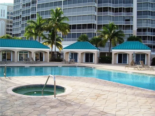 View of swimming pool featuring a gazebo, a hot tub, and a patio