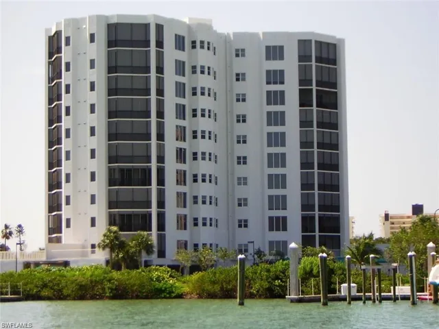 View of building exterior featuring a water view