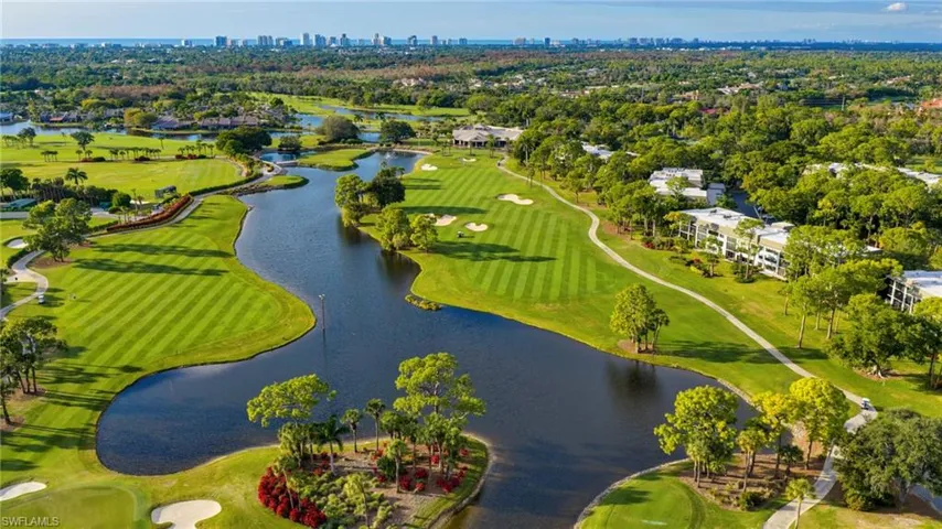 View of property location with a local golf course and city skyline