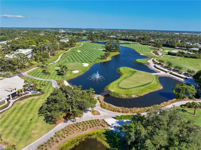 Bird's eye view of a local golf course and a nearby body of water