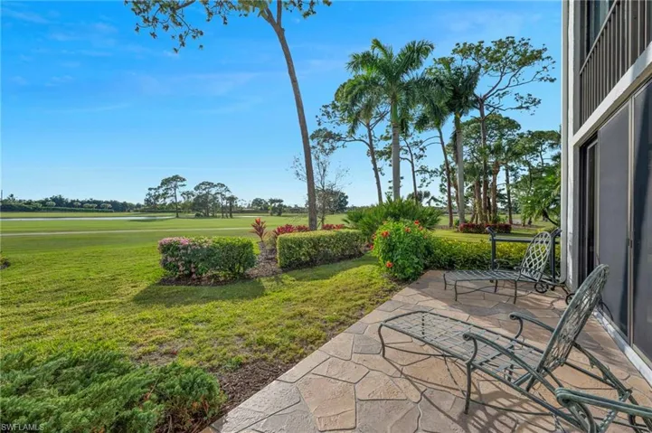 View of patio / terrace featuring view of golf course