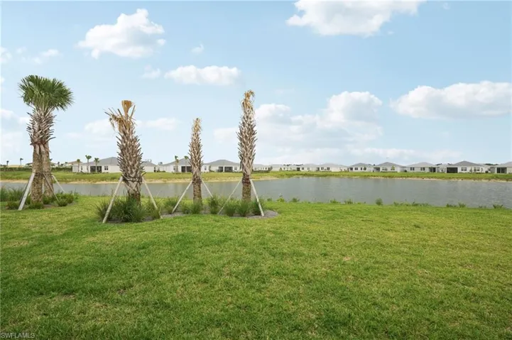 Water view featuring nearby suburban area
