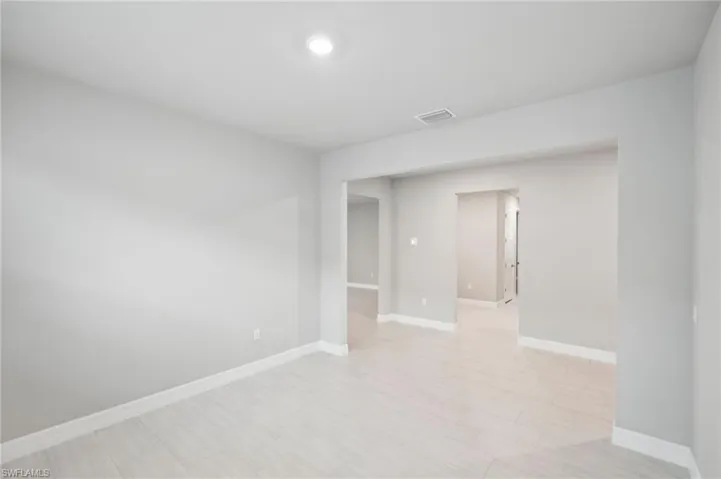 Spare room with baseboards