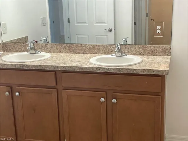 Full bath with double vanity