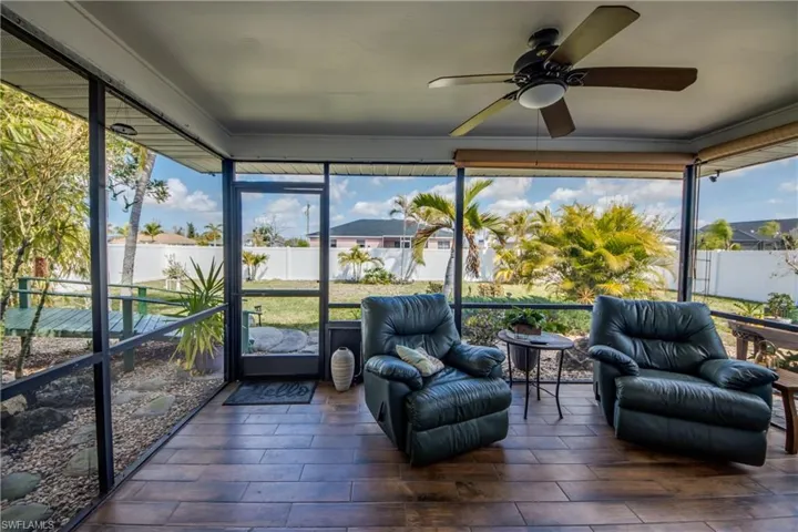Sunroom featuring wood tiled floors