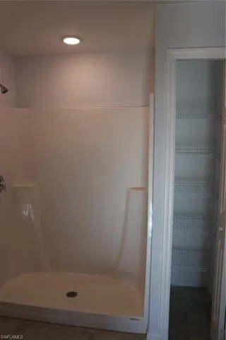Master Bathroom shower and linen closet