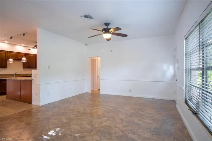 Unfurnished room with ceiling fan