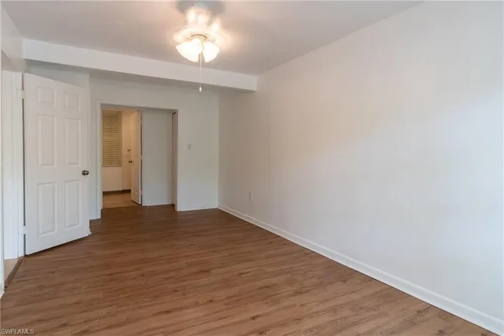Spare room with hardwood / wood-style flooring