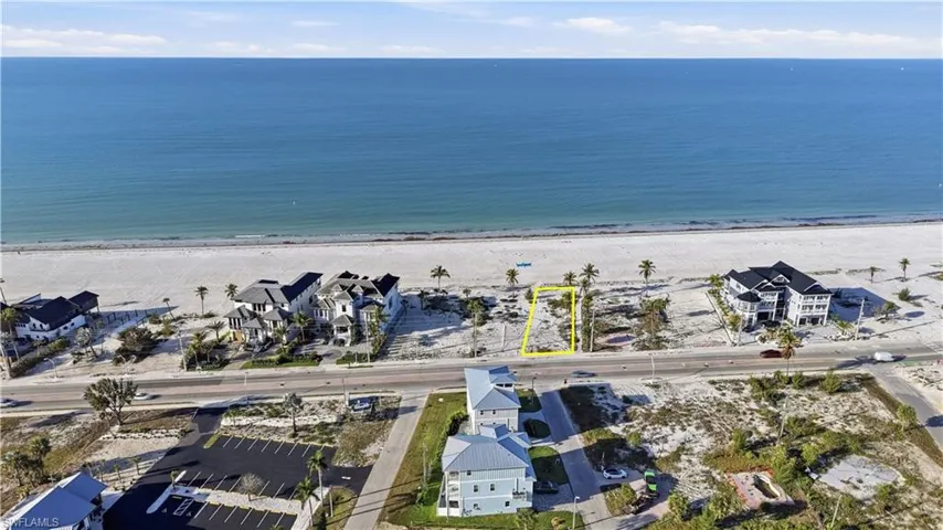 Aerial view of residential area with waterfront with a beach - Virtually Edited Image