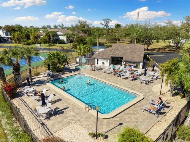 Community pool featuring a patio area