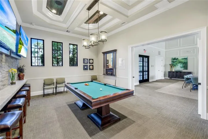 Recreation room featuring carpet, billiards table, coffered ceiling, ornamental molding, and beam ceiling