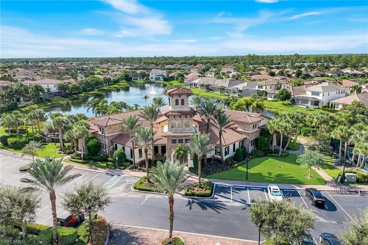 Aerial perspective of suburban area with a large body of water