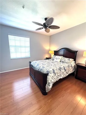 Guest bedroom with a Queen Bed 2 Night Stands and a Dresser