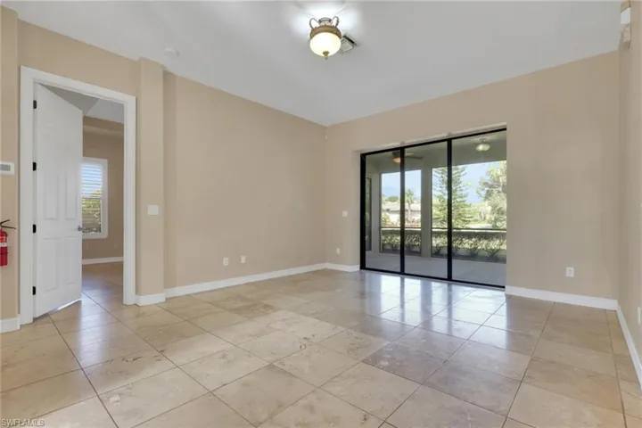 Empty room featuring baseboards