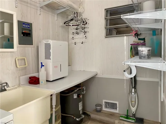 LAUNDRY ROOM with SINK & SHELVING