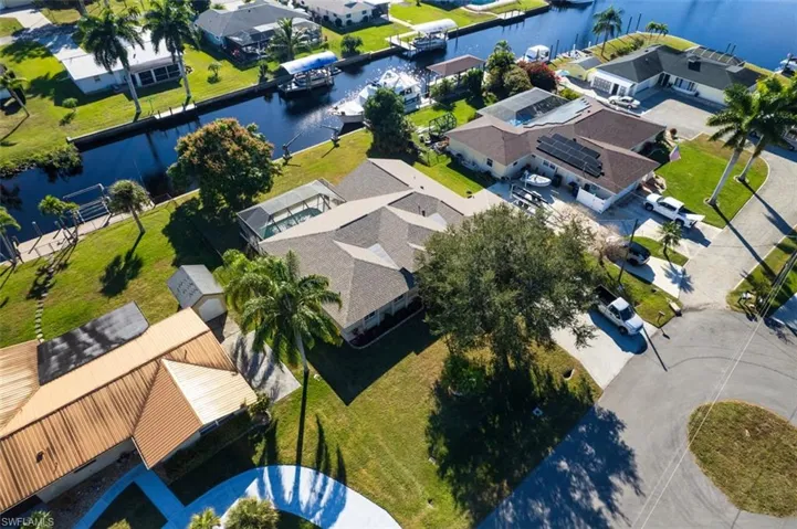 Aerial view of residential area with a large body of water