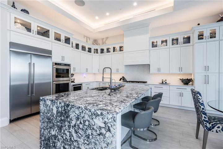 Double ovensProfessional counter depth fridge!