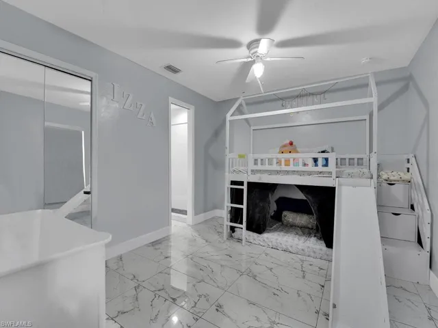 Bedroom featuring ceiling fan