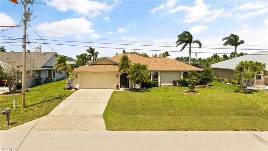 Certainly a beautiful canal pool home!