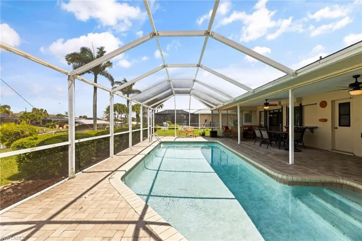 The pool & lanai are screened in and there is a large closet for pool supplies and boating needs.