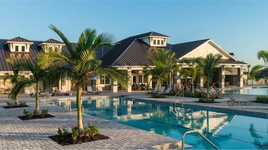 Community pool with a patio area