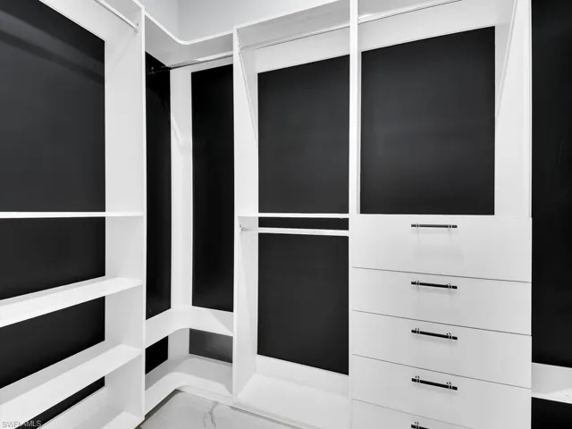 One of two custom closets in primary