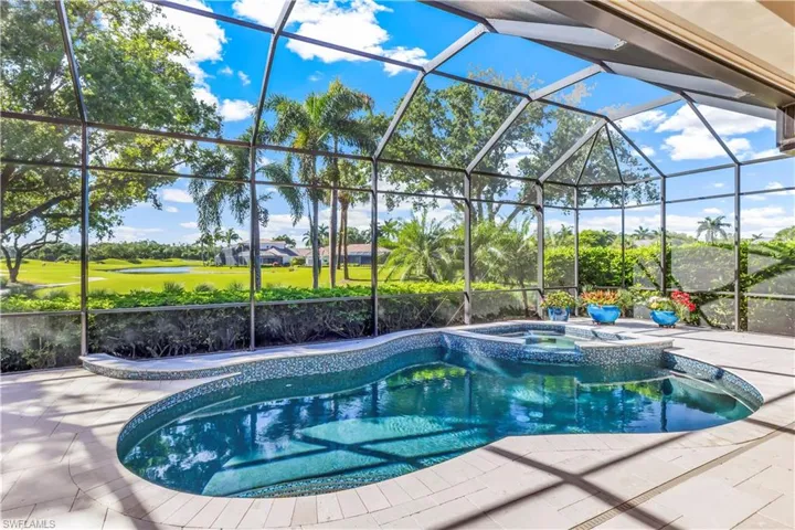 Pool & spa w/panoramic views of golf course & lake