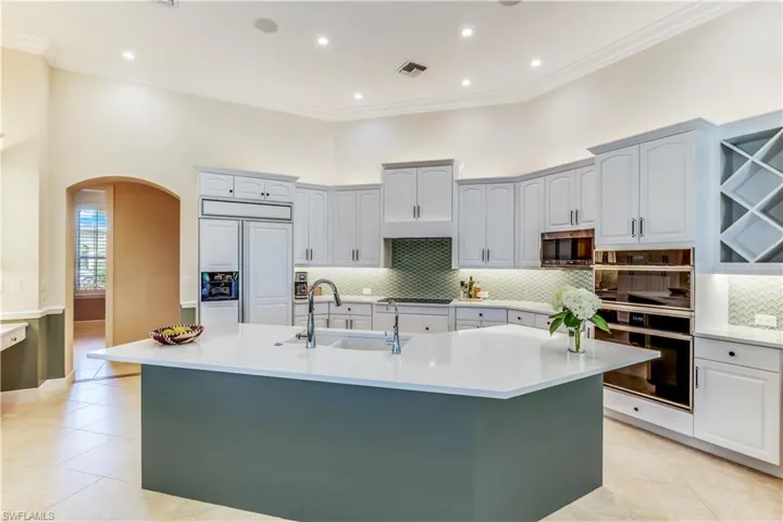 New Quartz countertops, top of the line appliances, backsplash, counter height island