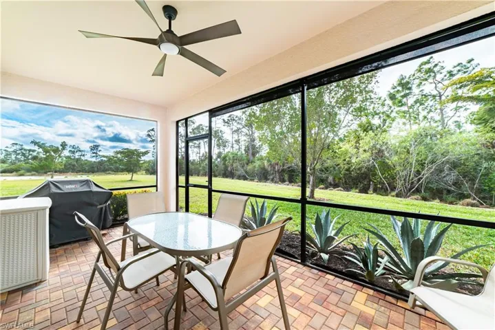 Screened lanai overlooks park like setting looking into Rookery Bay Reserve.