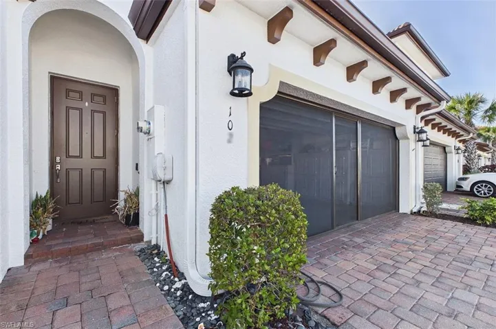 Garage featuring driveway