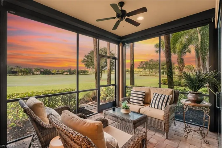 Screened lanai with paver flooring, recessed lighting, and ceiling fan