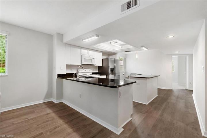 Add some stools for extra seating, you have the room in this kitchen.