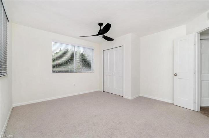 New third bedroom, new carpet, ceiling fan and closet. Large windows make this room bright and airy.