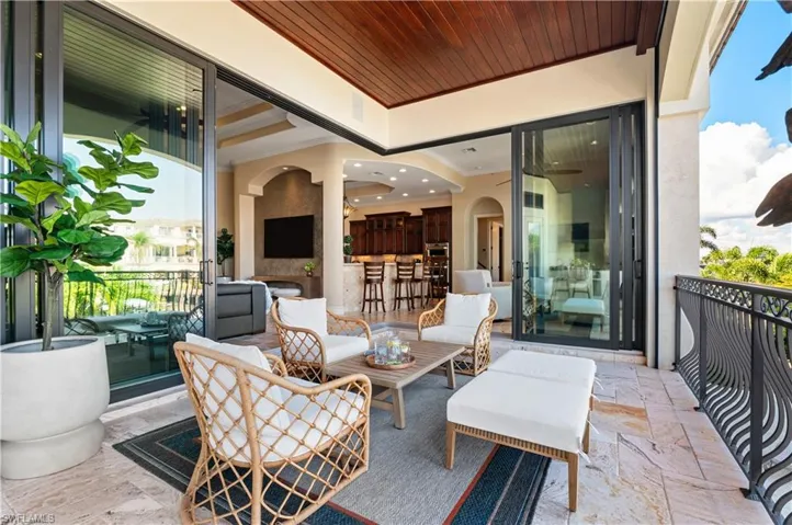 View of patio with an outdoor hangout area