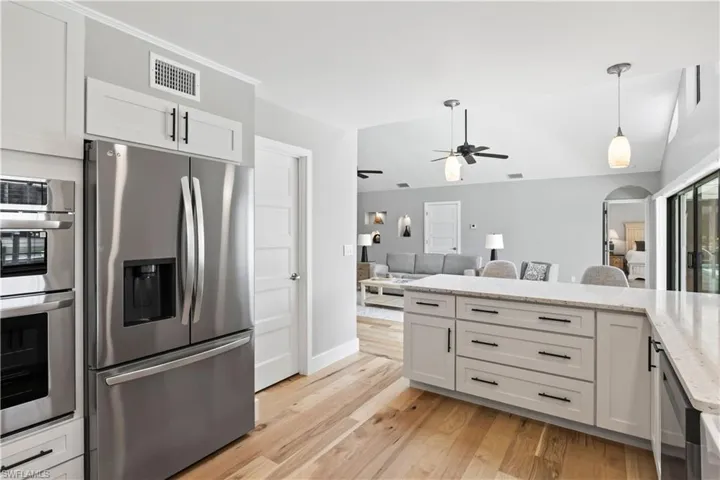 Plenty of space both cabinetry and countertops and a large walk-in pantry.