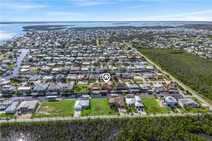 Aerial view showcasing a tranquil waterfront setting.