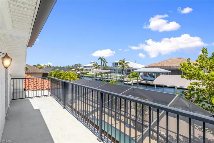 The balcony offers a serene outdoor escape with plenty of space to relax, enjoy morning coffee, or take in the surrounding views and fresh air.