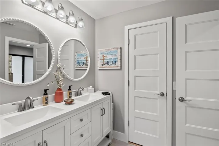 Double vanities, walk in closet and check out those beautiful doors - devil is in the details!