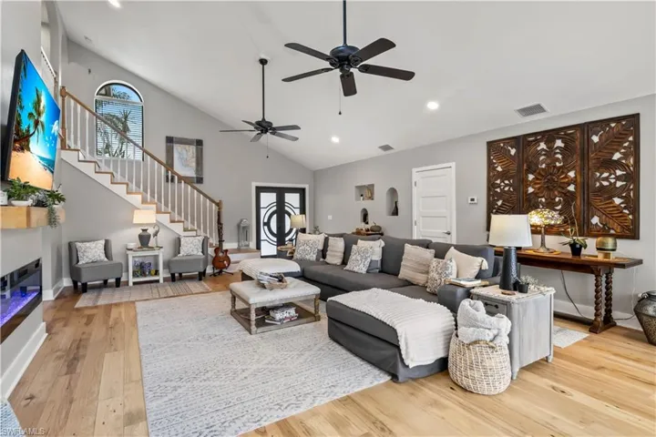 Bright and inviting living room featuring an open layout, natural light, and stylish finishes. A comfortable space perfect for relaxing or entertaining.