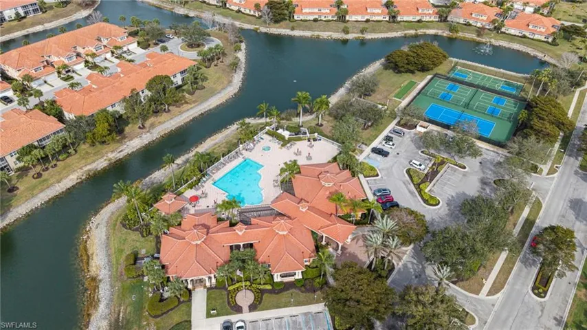 Aerial overview of property's location featuring a nearby body of water