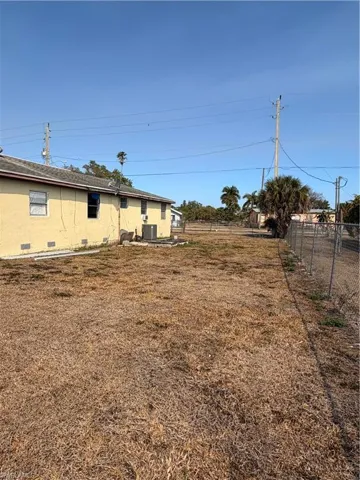 View of fenced backyard