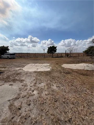 View of yard with a view of countryside
