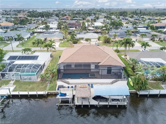 Aerial view of residential area with a large body of water